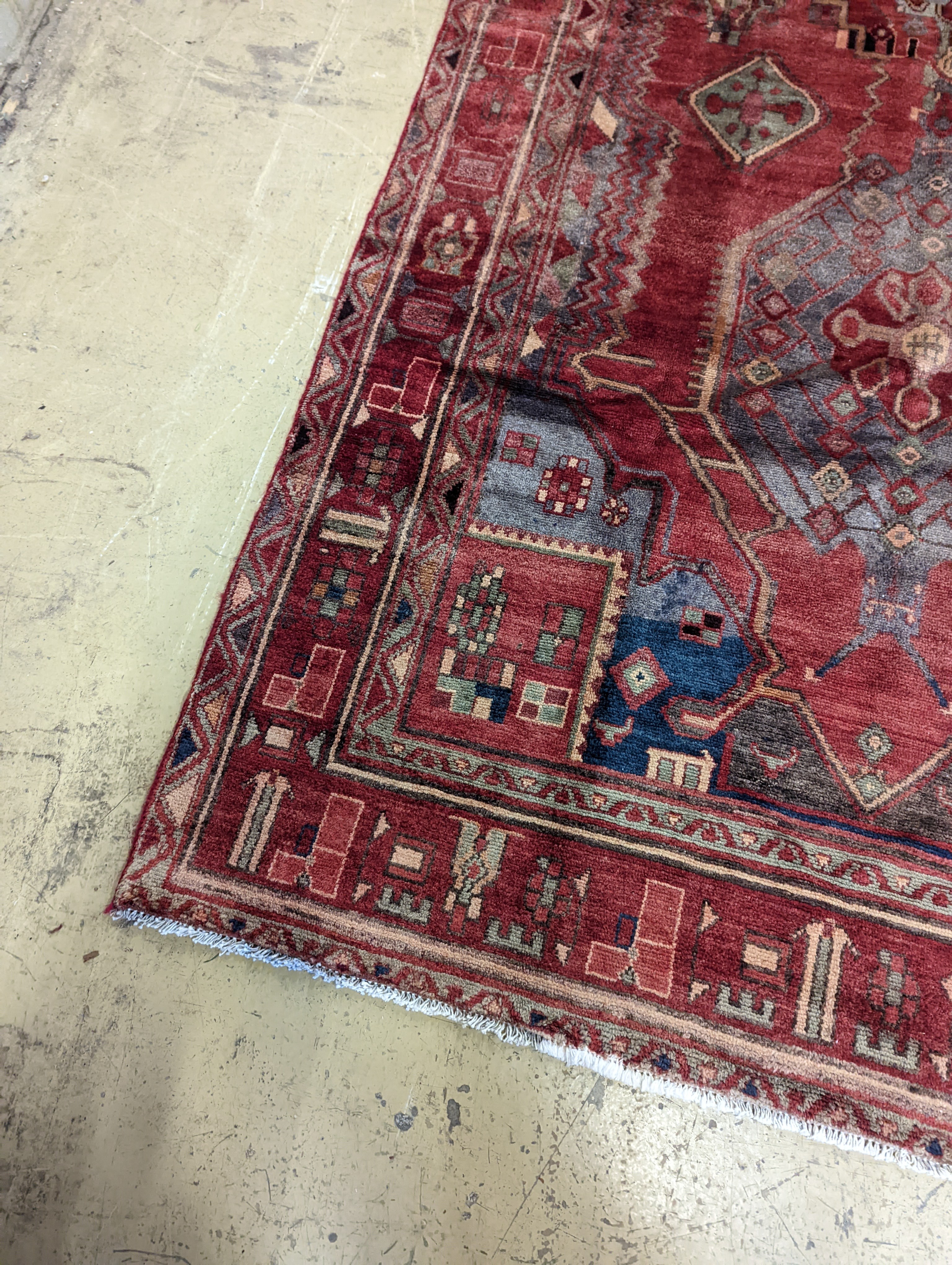An Ardabil red ground carpet, 322 x 157cm